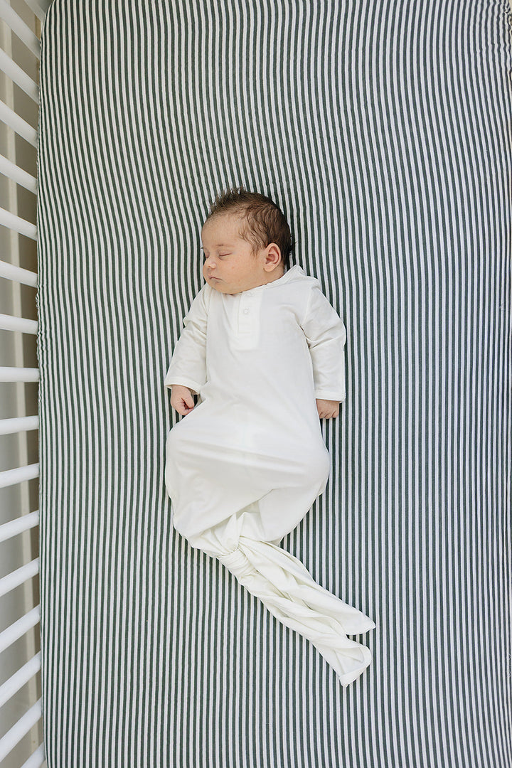 Soft and breathable, the Mebie Baby Green Stripes Muslin Crib Sheet works as some of the best crib sheets available.