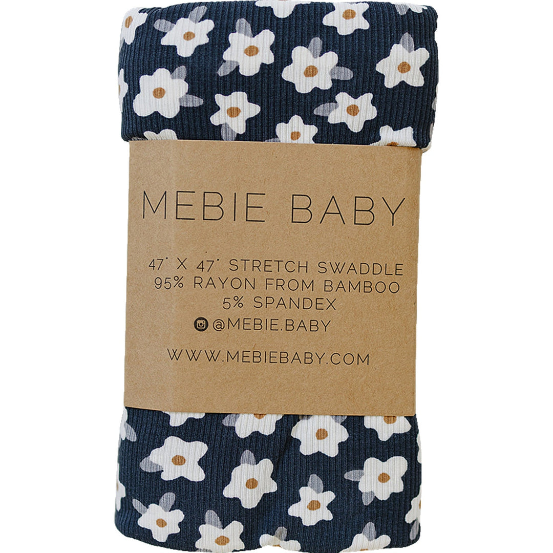 Mebie Baby Navy Daisy Ribbed Bamboo Stretch Swaddle wraps your newborn in soft, cozy comfort as a baby swaddle.