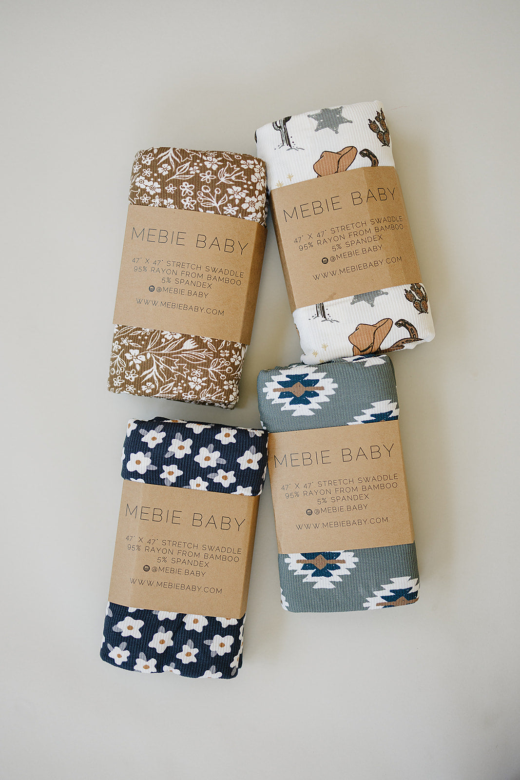Mebie Baby Navy Daisy Ribbed Bamboo Stretch Swaddle makes naptime cozy, perfect swaddle for babies.