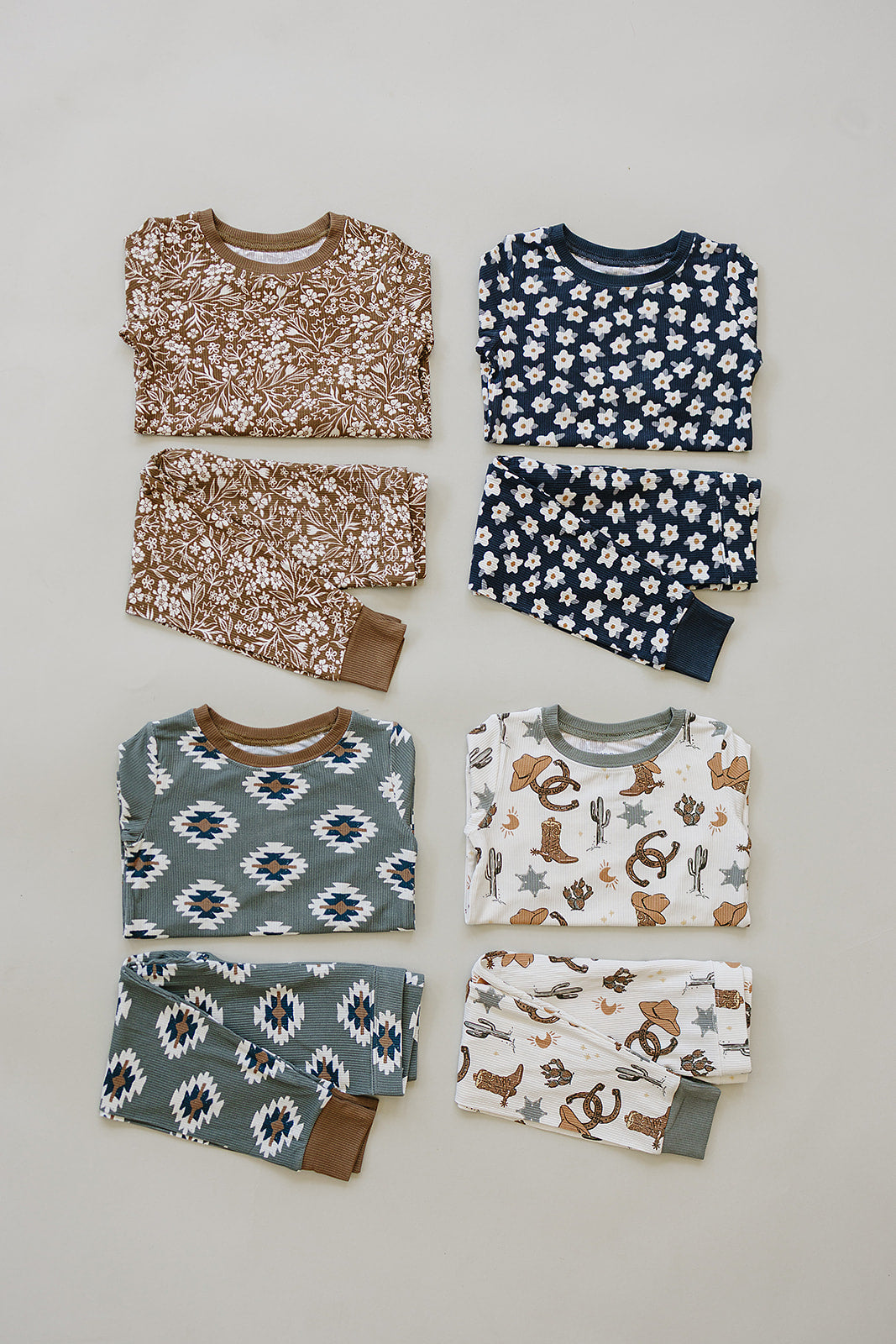 Designed with stretch and softness, the Mebie Baby Brown Floral Ribbed Bamboo Cozy Set is great for organic baby clothes