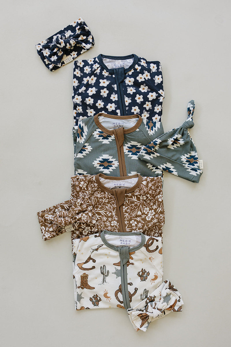 Made for comfort and style, the Mebie Baby Southwest Aztec Ribbed Bamboo Zipper delivers a fresh take on cute onesies
