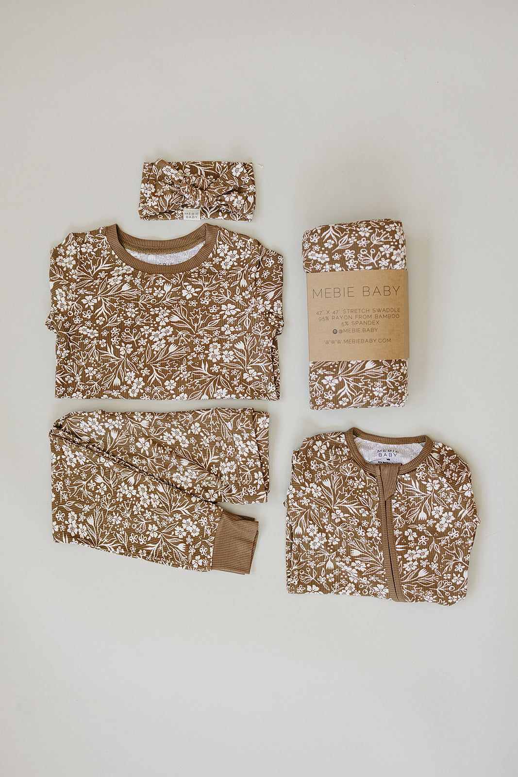 The Mebie Baby Brown Floral Ribbed Bamboo Cozy Set offers a sweet and practical option for cute baby clothes