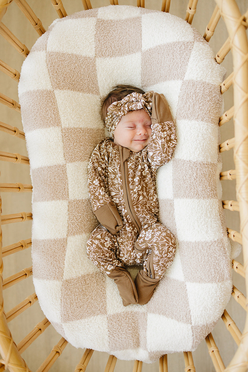 Designed for easy changes, the Mebie Baby Brown Floral Ribbed Bamboo Zipper works well as comfy onesie pajamas