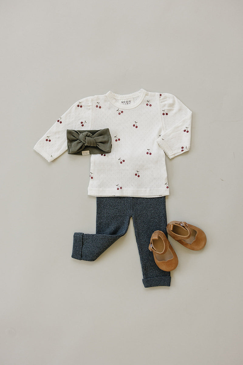 The Mebie Baby Cherry Pointelle Long Sleeve Tee offers timeless style and comfort in best baby clothes