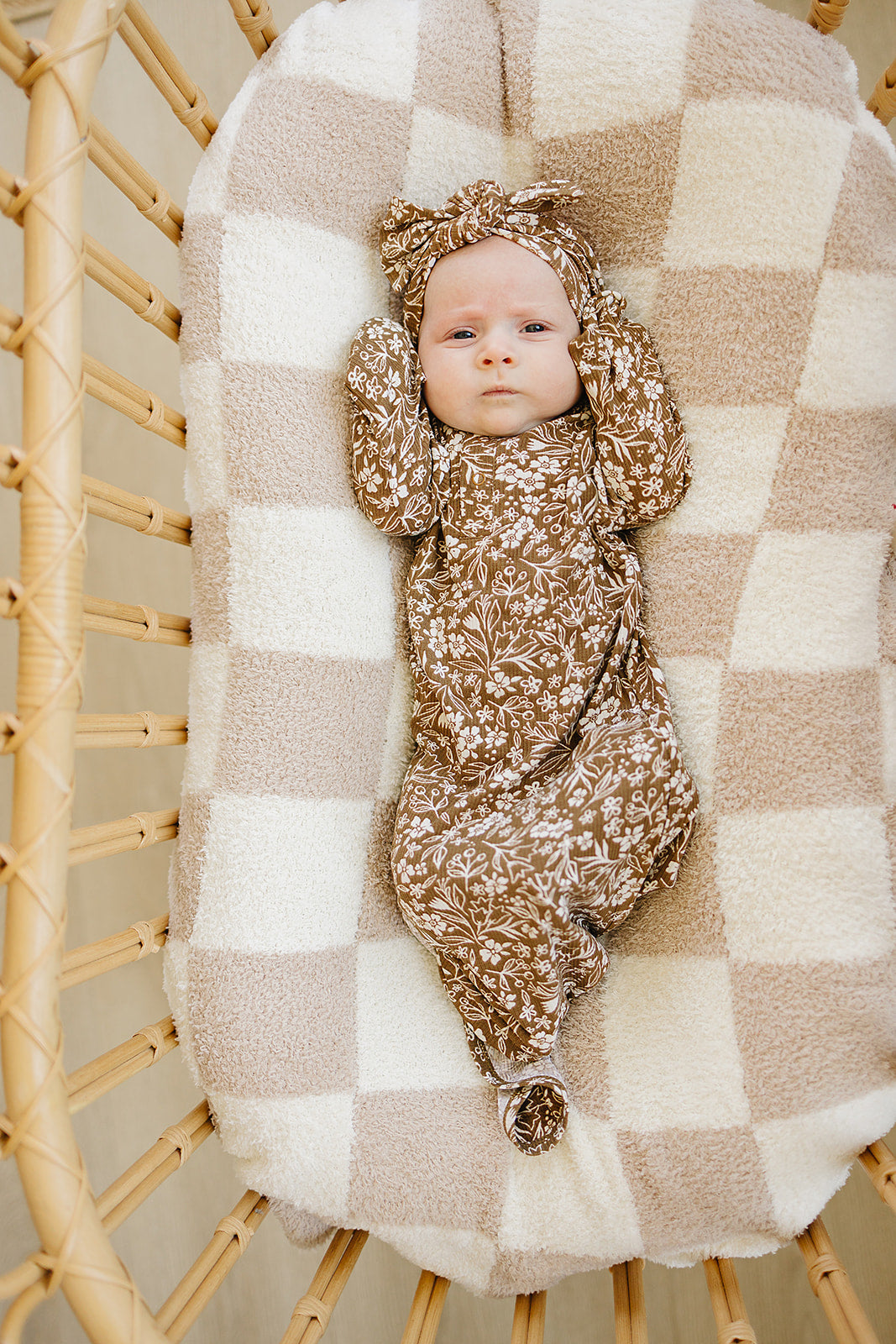 A charming floral print defines the Mebie Baby Brown Floral Ribbed Bamboo Knot Gown, perfect for parents shopping bamboo baby pajamas