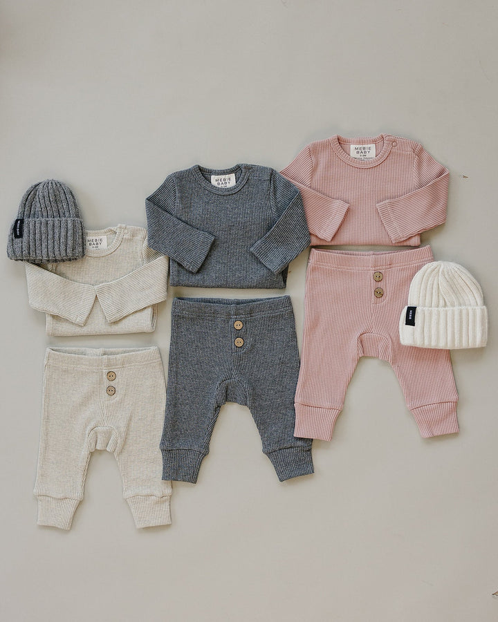 Little ones stay comfortable in the Mebie Baby Charcoal Bodysuit Waffle Set, a top choice for baby bamboo pajamas