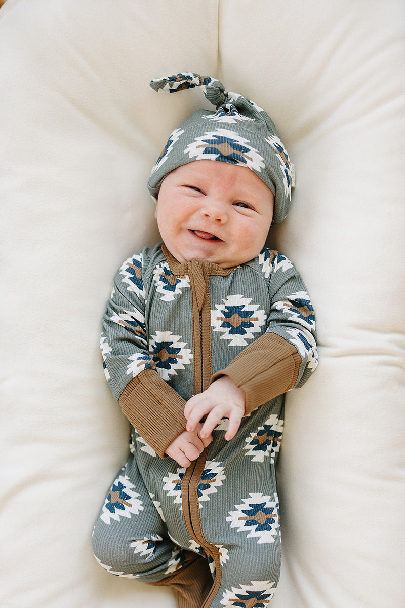 Breathable ribbed bamboo gives the Mebie Baby Southwest Aztec Zipper a gentle feel among modern baby onesies