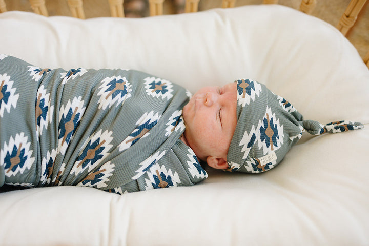 Cuddle your infant in the Mebie Baby Southwest Aztec Ribbed Bamboo Stretch Swaddle, a soft baby swaddle wrap.