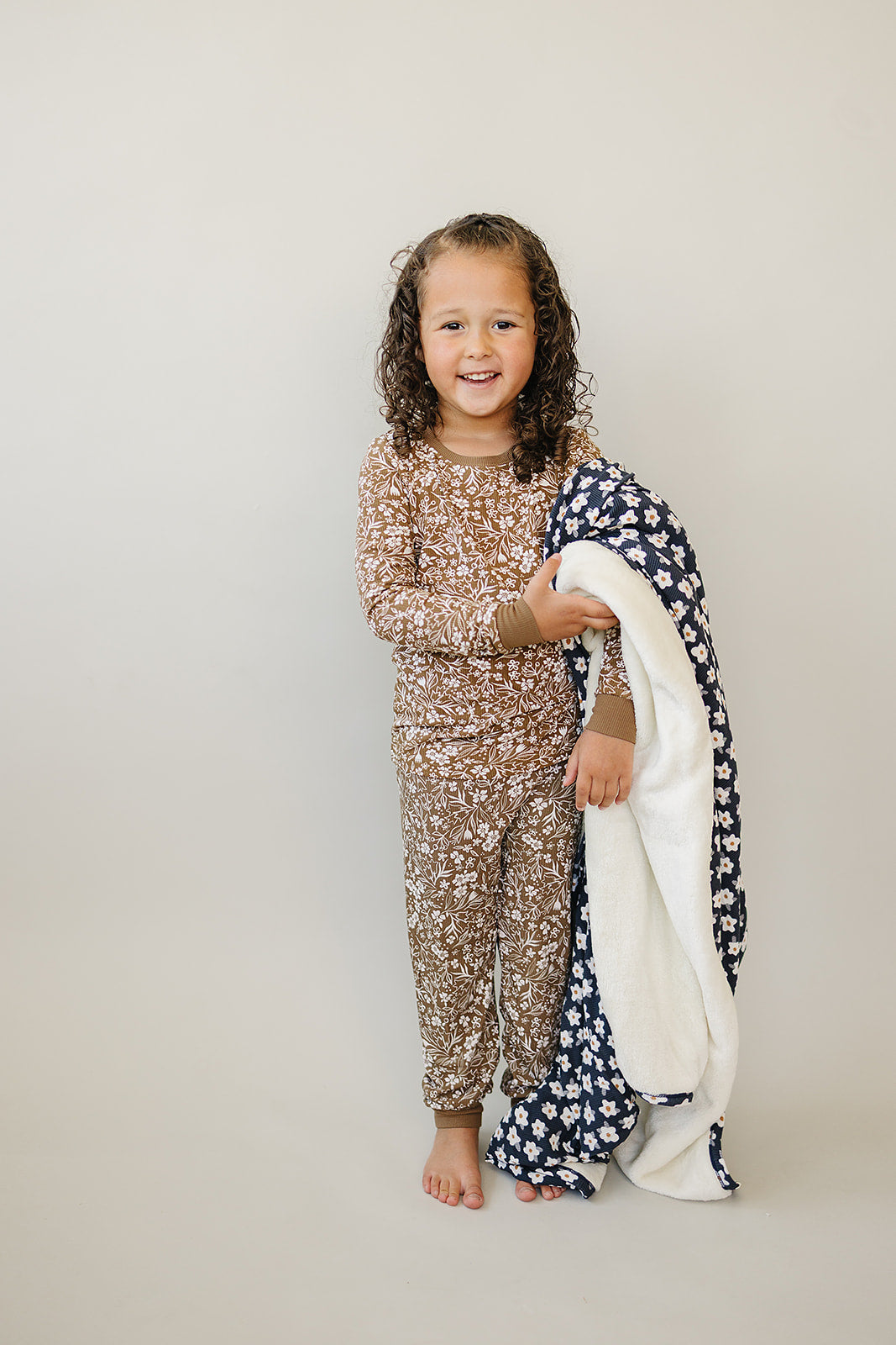 Featuring ribbed bamboo fabric, the Mebie Baby Brown Floral Cozy Set works beautifully as bamboo baby pajamas