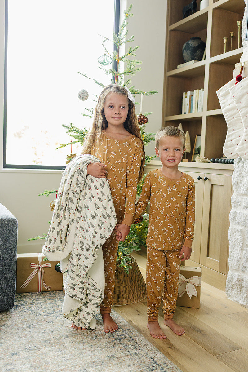 Soft and plush, the Mebie Baby Christmas Trees Bamboo Fleece Quilt serves as one of the best baby blankets.