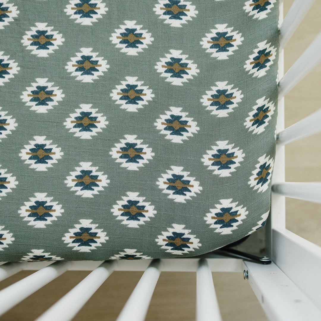 The Mebie Baby Southwest Aztec Muslin Crib Sheet features soft fabric, perfect crib sheets for baby nurseries.
