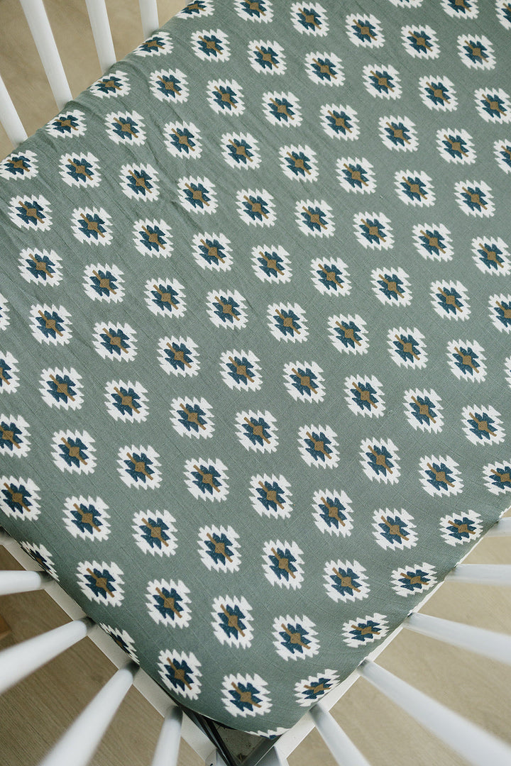 Mebie Baby Southwest Aztec Muslin Crib Sheet adds style and softness, making it one of the best crib sheets.