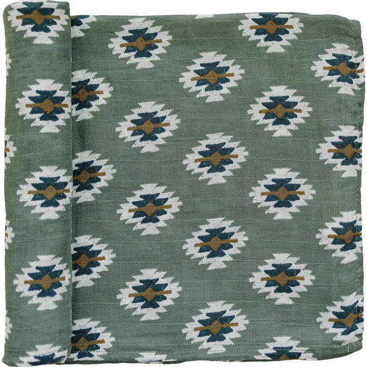 Soft and breathable, the Mebie Baby Southwest Aztec Muslin Swaddle Blanket wraps babies in cozy comfort.