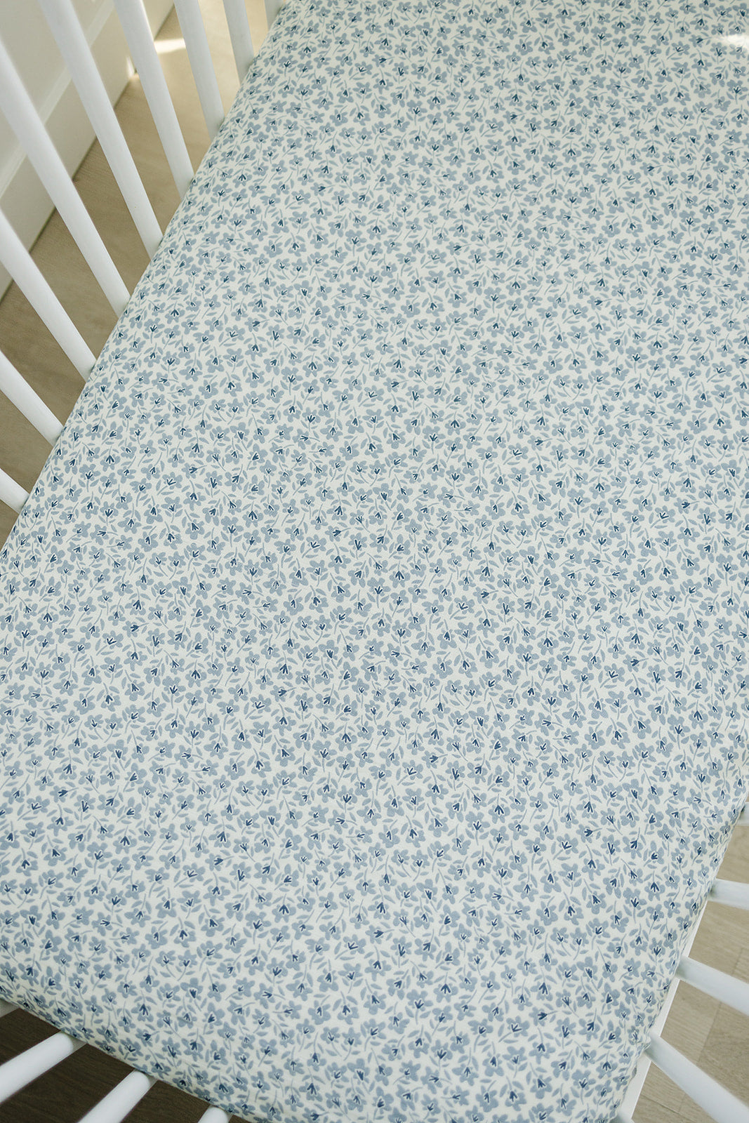 Wrap your little oneÕs mattress in comfort using the Mebie Baby Blue Blossom Muslin Crib Sheet, ideal baby crib sheets.