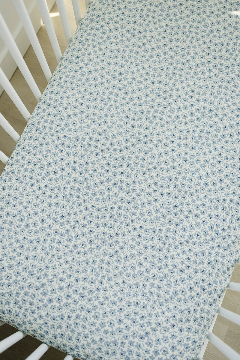 Wrap your little oneÕs mattress in comfort using the Mebie Baby Blue Blossom Muslin Crib Sheet, ideal baby crib sheets.