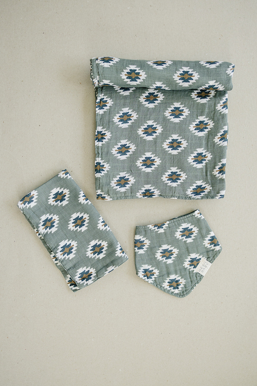 The Mebie Baby Southwest Aztec Muslin Swaddle Blanket is perfect as a swaddling muslin blanket for infants.