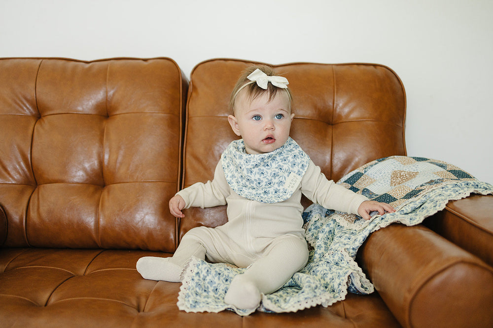 Soft and stylish, the Blue Blossom Classic Muslin Bib by Mebie Baby makes perfect bibs for babies.