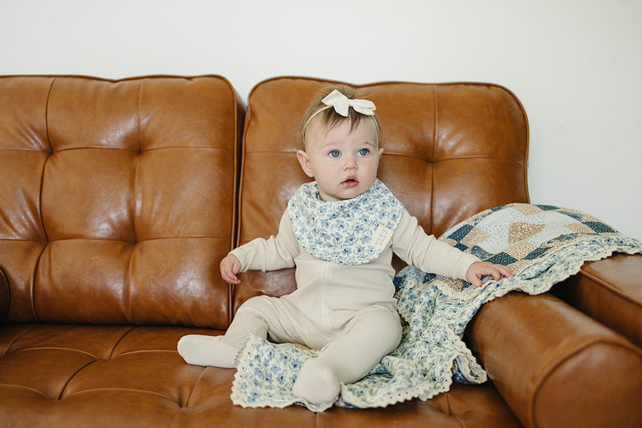 Soft and stylish, the Blue Blossom Classic Muslin Bib by Mebie Baby makes perfect bibs for babies.