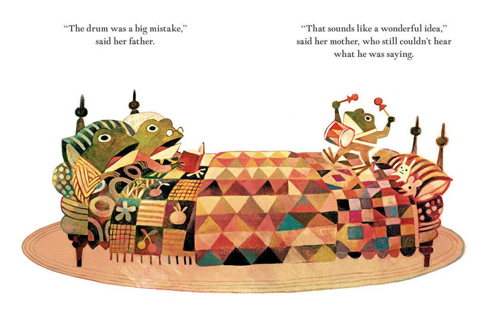 Pokko plays her drum on a patterned rug in this Pokko and the Drum hardcover illustration