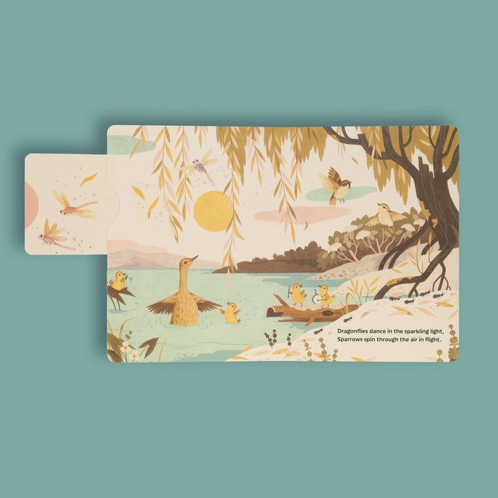 Interior spread of Sunrise Dance showing sunlit pond and dancing dragonflies