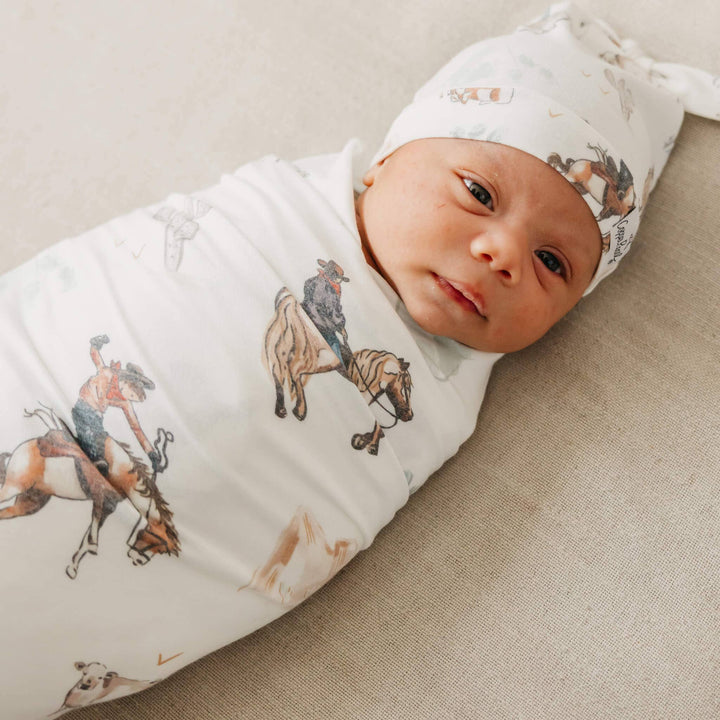 Copper Pearl Boone 46x46 muslin-style knit swaddle blanket in soft gender-neutral tones