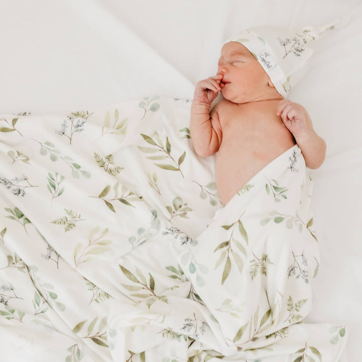 Copper Pearl Haven 46x46 muslin-style knit swaddle blanket in soft gender-neutral tones