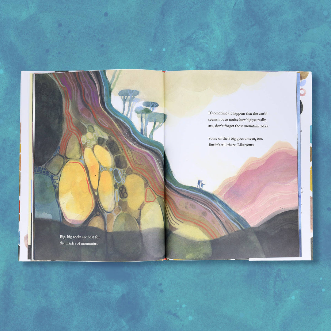 closing illustrated spread of a child holding a treasured rock close to their heart