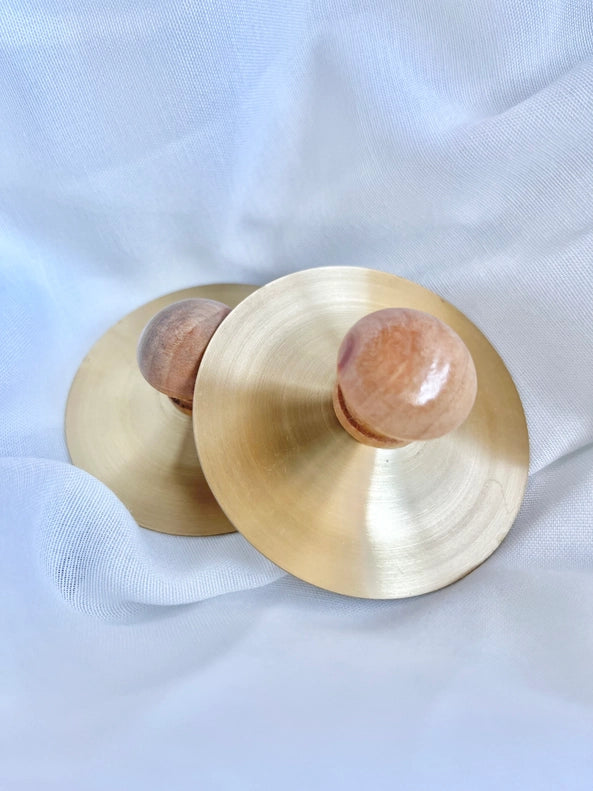 All Wooden Elements Pair of 2 Petit Cymbals placed beautifully, giving little learners a soft introduction to music toys.