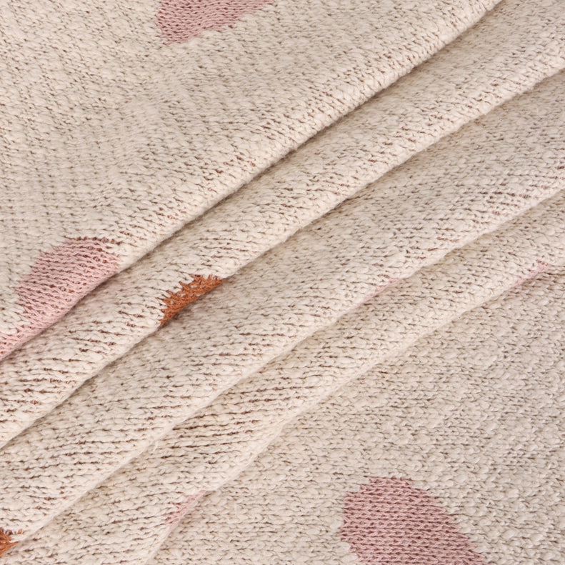 Viverano Organics Organic Cotton Jacquard Knit Baby Blanket in Loving Hearts is a soft and breathable organic baby blanket for everyday use.