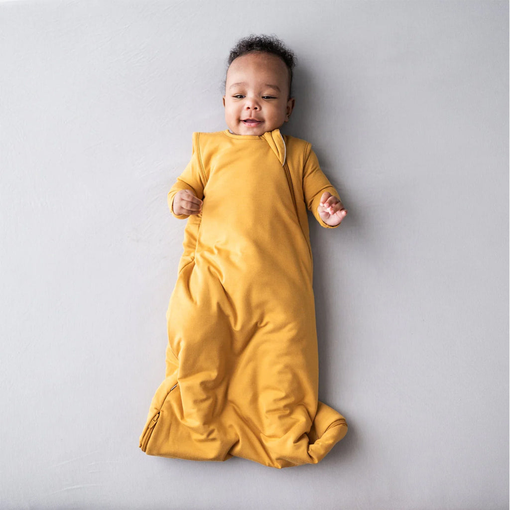 baby lying in kyte bamboo sleep sack