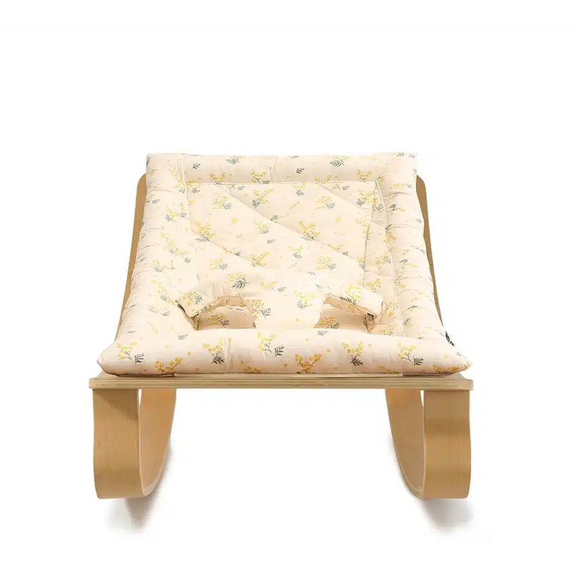 A refined nursery moment with the Levo Rocker by Charlie Crane in mimosa, blending organic design and baby safe comfort