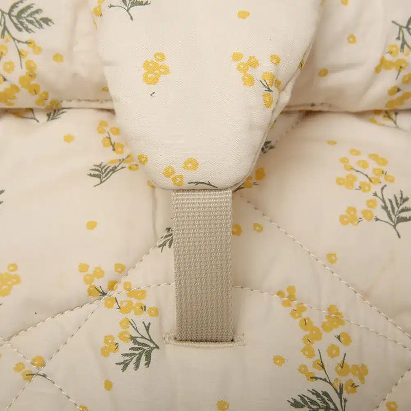 Soft organic fabric featured on the Charlie Crane Levo Rocker Beech Wood in organic milk for infant lounging