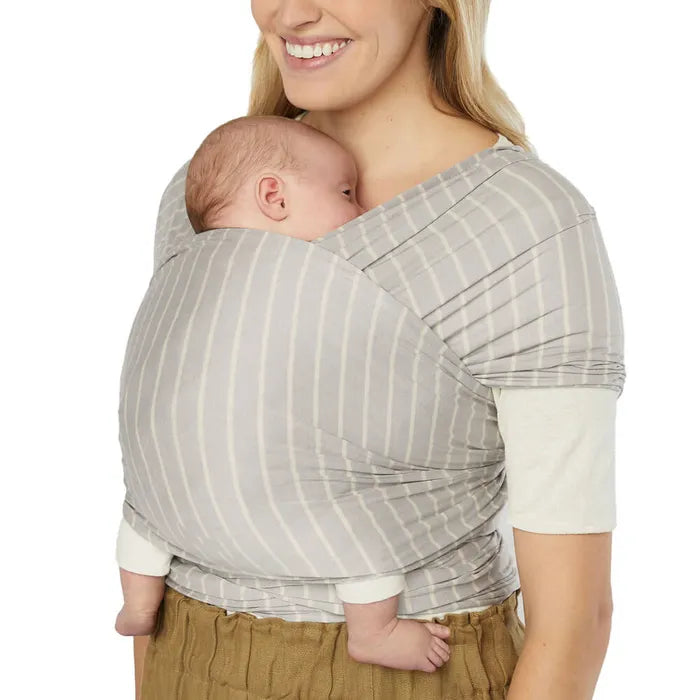 Effortlessly chic, the Ergobaby Aura Baby Wrap in Grey Stripe delivers breathable support in a baby wrap sling.
