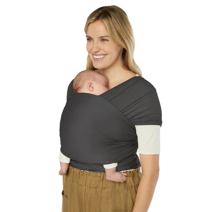 Cozy up your little one with the Ergobaby Aura Baby Wrap in Soft Black, a sleek and secure baby wrap.