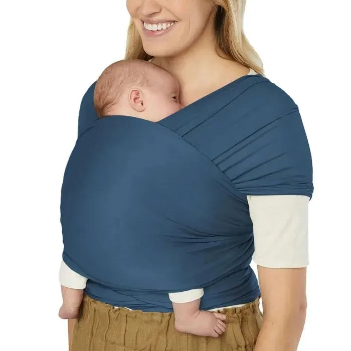 In Twilight Navy, the Ergobaby Aura Baby Wrap is a calming baby wrap sling designed for comfort and ease.