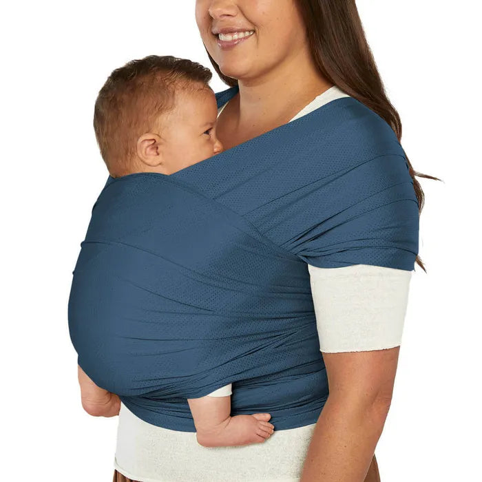 Stay cool and supported in the Navy Ergobaby Aura Baby Wrap Mesh, an airy baby wrap ideal for warm days.