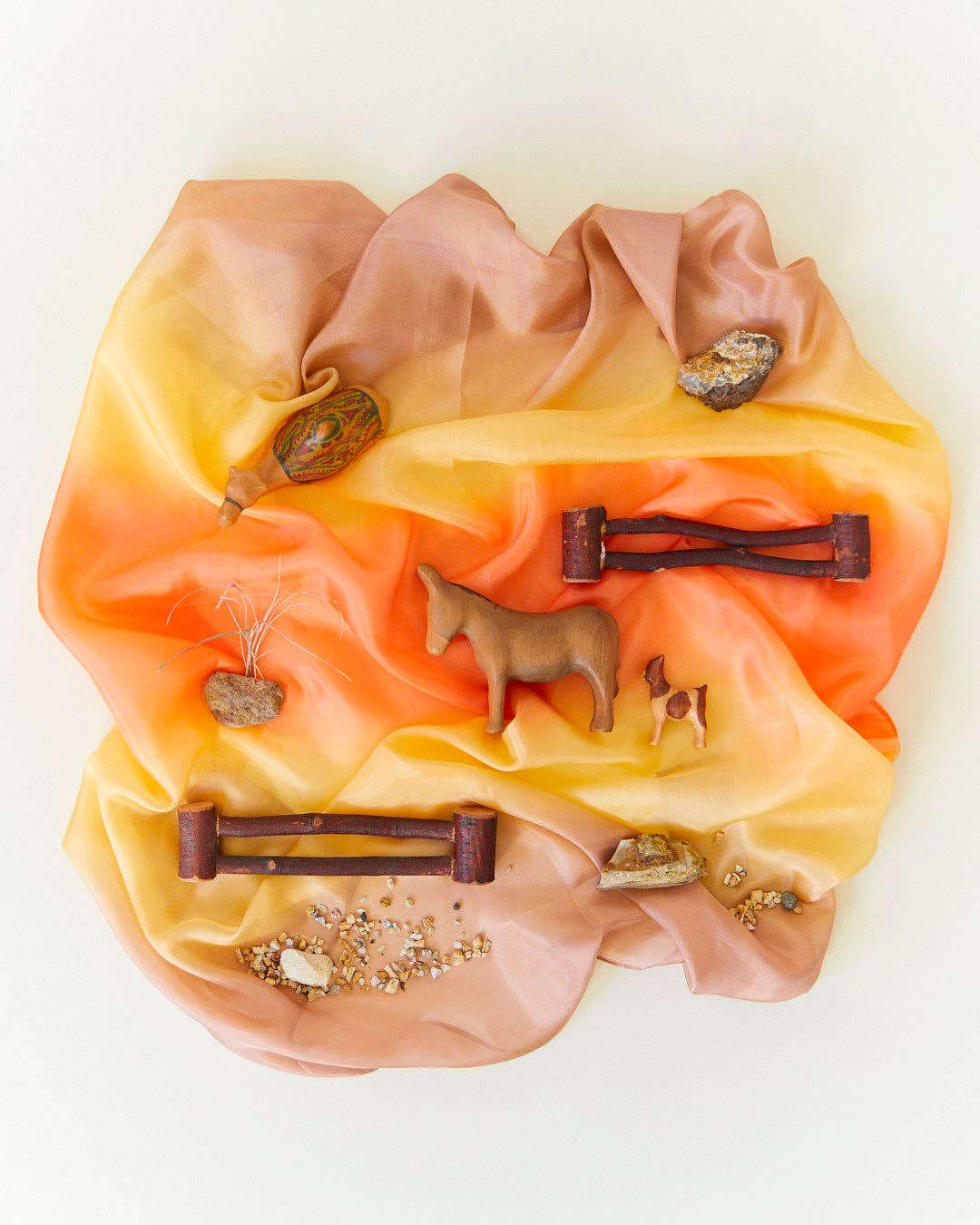 Playful scenes come alive with the Sarah’s Silks Earth Playsilk in Stone, ideal for open play activities.