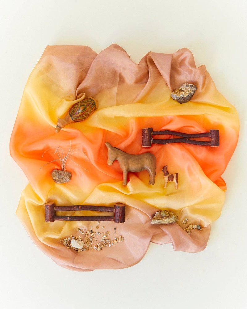 Playful scenes come alive with the Sarah’s Silks Earth Playsilk in Stone, ideal for open play activities.