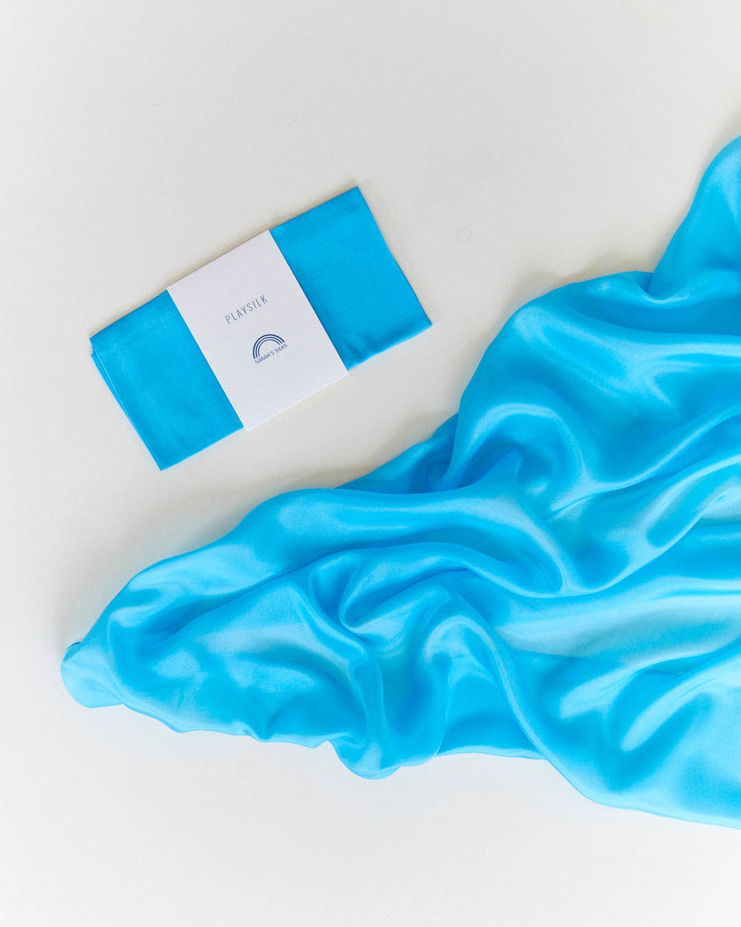 Sarah's Silks Solid Color Playsilks turquoise scarf shown flat, a favorite dress up toy