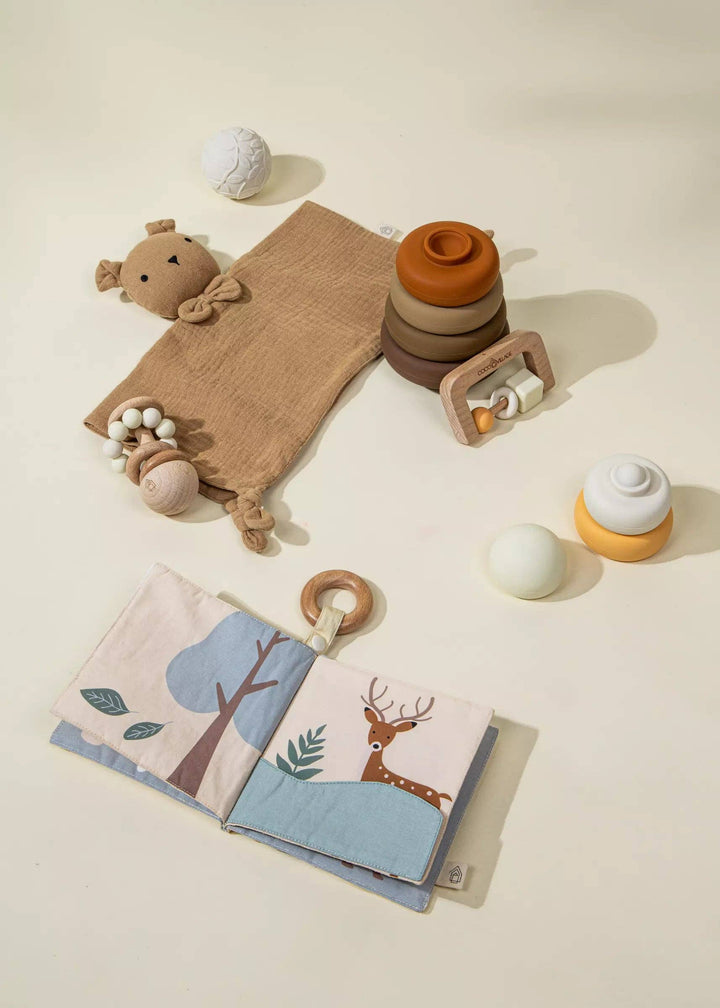 The Coco Village Baby First Toys Gift Box offers a curated mix of soft and tactile infant toys to support sensory play from day one.