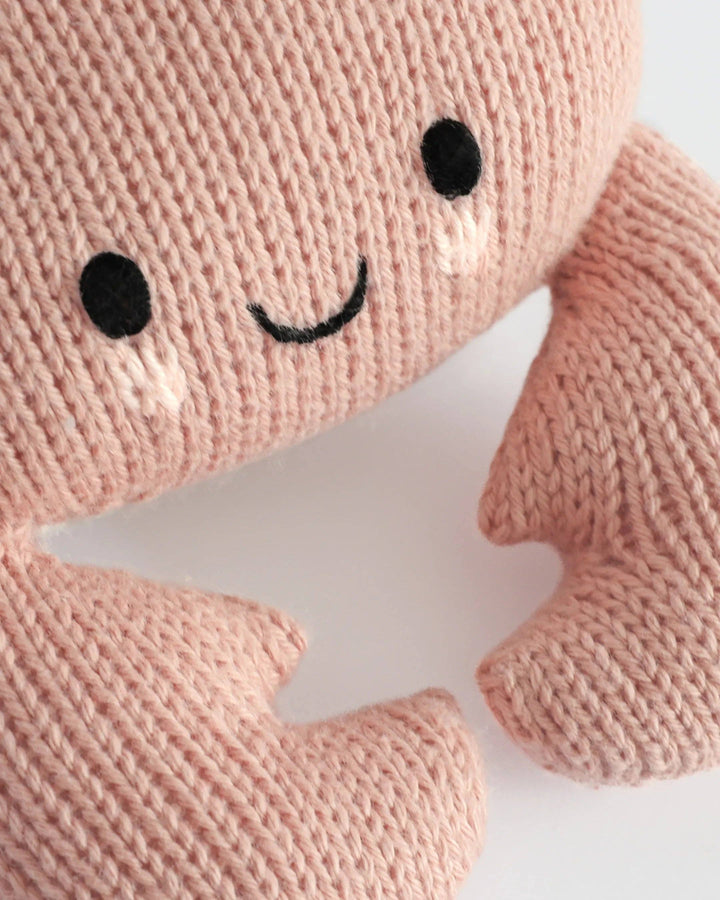 Cuddle + Kind Baby Crab in Blush, hand-knit crab stuffed animal for babies