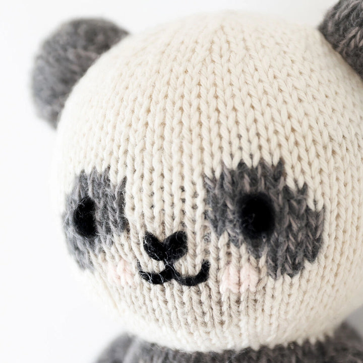 This adorable panda from Cuddle + Kind Baby Animals is a classic toy animal favorite.