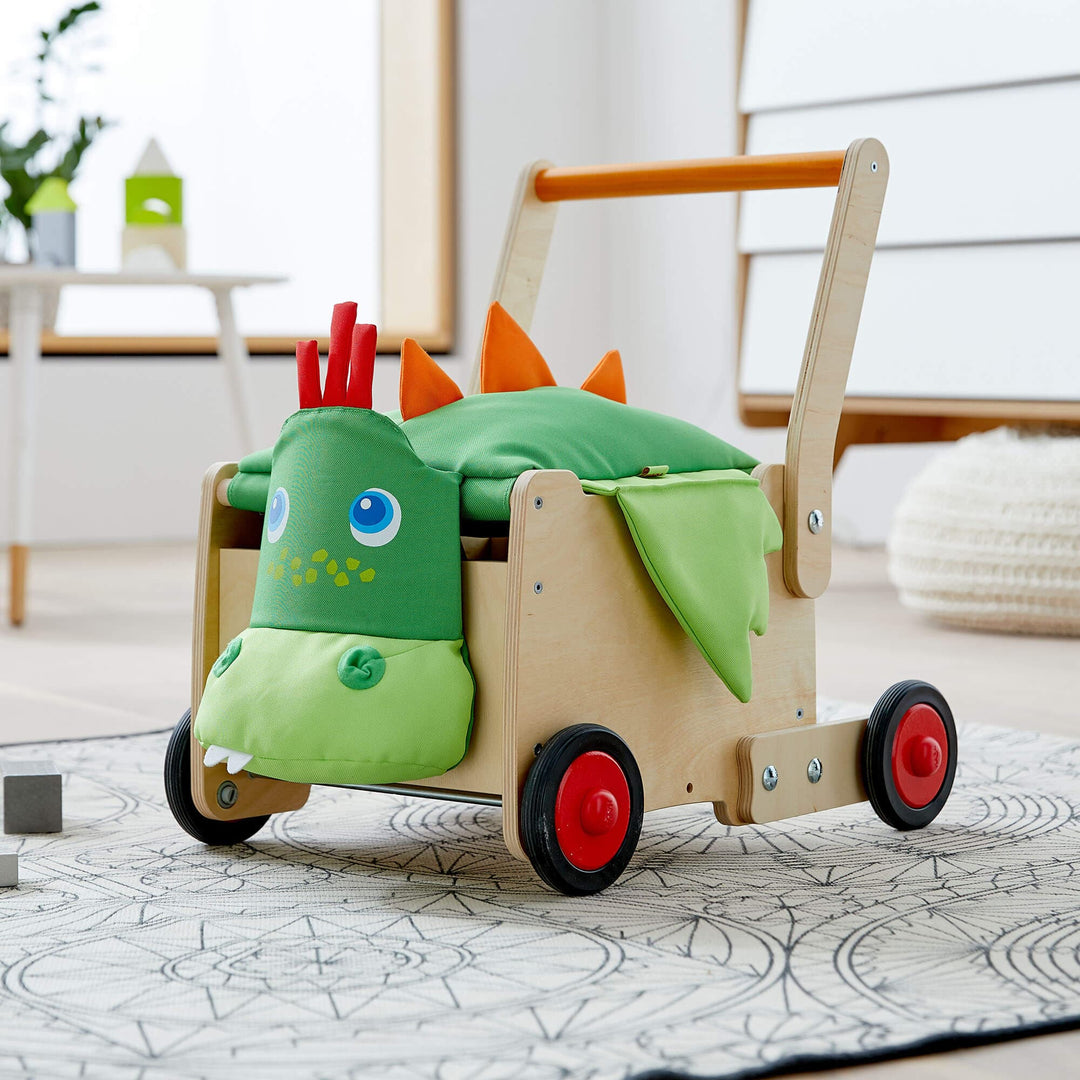 Help your child develop motor skills with the HABA baby walker dragon box, a wooden toy.