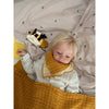 baby wearing yellow fabelab bib