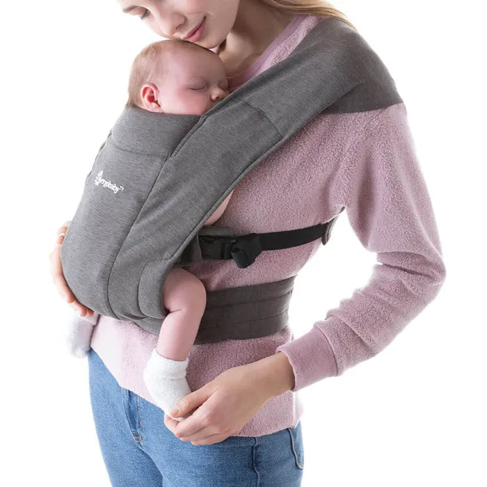 Made for comfort, the Heather Grey Ergobaby Embrace Newborn Carrier functions beautifully as a baby chest carrier.