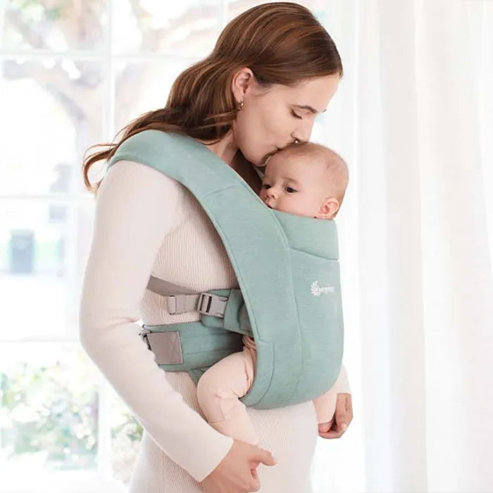 Fresh and modern, the Jade Ergobaby Embrace Newborn Carrier is ideal as a comfortable baby carrier for new parents.
