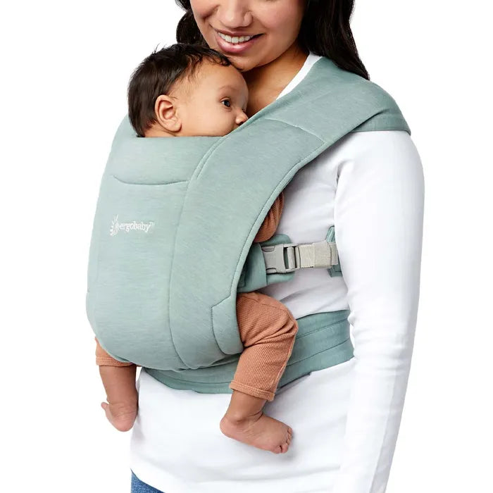 Go hands-free in style with the Jade Ergobaby Embrace Newborn Carrier, your perfect newborn baby carrier.