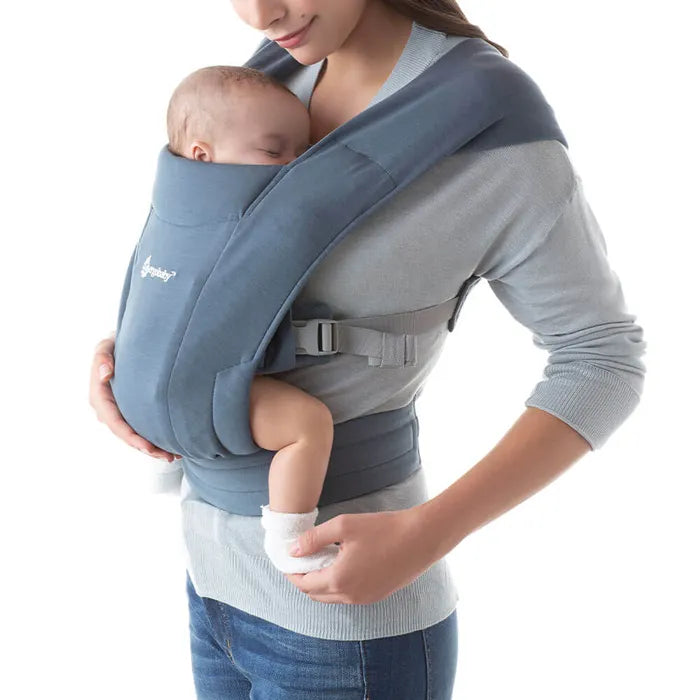 Oxford Blue gives the Ergobaby Embrace Newborn Carrier a sleek look while functioning as a best baby carrier.