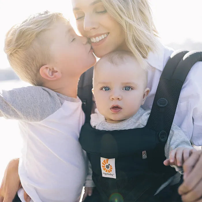 Sporting a camo design, the Ergobaby Omni Classic in Onyx Black delivers a rugged front baby carrier look.