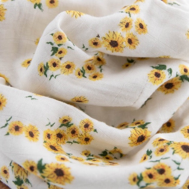 Little Unicorn Deluxe Muslin Baby Quilt - Ditsy Sunflower featuring bright floral design, gentle muslin blanket for babies